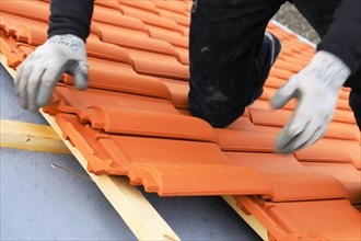Roofing work, re-roofing of a tiled roof