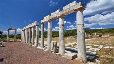 A row of ancient marble columns against a blue sky, Stoa of the Agora, Archaeological site, Ancient