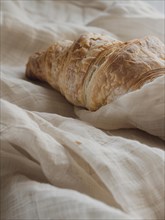 Croissant bread on a cloth, AI generated