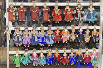 Puppets as souvenirs at Htilominlo Temple, Bagan, Myanmar, Asia