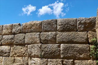 Detail of an old stone wall with visible stone structures, Archaeological site, Ancient Messene,