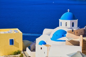 White churches with blue domes, Ia, Oia, Santorini, Cyclades, Greece, Europe