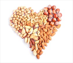 Heart made from different kinds of nuts isolated on white background. hazelnut, brazil nut, almond,