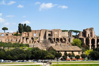 Ruins of the Palatine in Rome under a clear blue sky, testimony to ancient history and culture