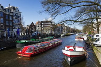 Canal cruise with typical tourist boat, tour, canal tour, city tour, tourism, city trip, holiday,