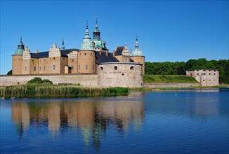 Kalmar Castle with its reflection in the water on a sunny day