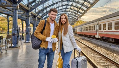 AI generated, A young couple wants to travel and is waiting for the train at the station, 20, 25,