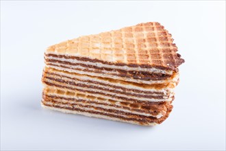 Waffle sandwiches with boiled condensed milk isolated on white background. closeup