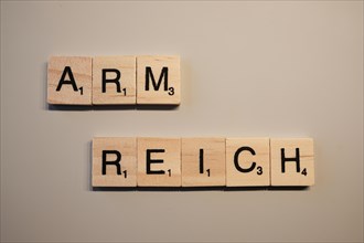 Arm Reich lettering, wooden letters, North Rhine-Westphalia, Germany, Europe