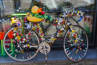 Colourfully decorated bicycle, decoration, symbol, symbolic, whimsical, mobility, Amsterdam,