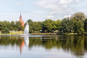 View of the city park and the church from the lake Druskonis. lithuania