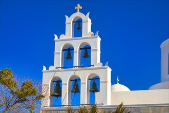 Santorini, Oia, bell tower of the church Panagia Platsani at the main square, Cyclades, Greece,
