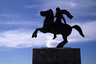 Statue, monument, military leader Alexander the Great on his horse Voukefalas, promenade,