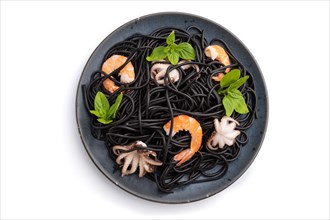Black cuttlefish ink pasta with shrimps or prawns and small octopuses isolated on white background.