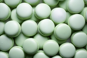 Top view of many pastel green French macarons sweets. KI generiert, generiert AI generated