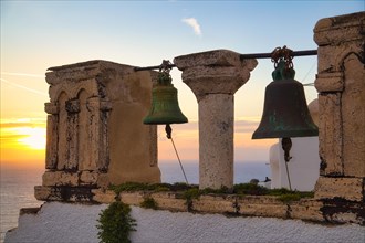Bell tower at sunset, Oia, Santorini, Cyclades, Greece, Europe