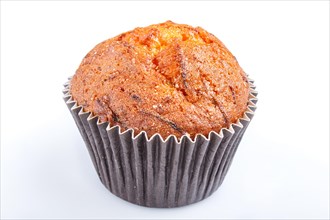 One carrot muffin isolated on white background. closeup