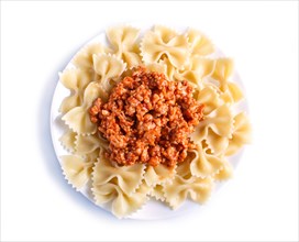 Farfalle bolognese pasta with minced meat isolated on white background. top view