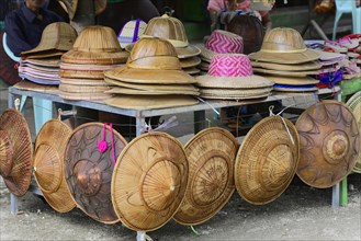 Hats, straw hats on poles, Mingun, Myanmar, Asia