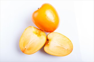 Ripe orange persimmon isolated on white background. closeup