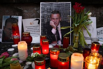 Photos, candles, grave lights and flowers for the Russian opposition leader Alexei Navalny, who