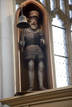 Wooden clock jack figure dated 1682 Holy Trinity church, Blythburgh, Suffolk, England, United