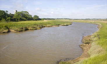 View upstream of levees and flood plain of tidal River Blyth, Blythburgh, Suffolk, England, United