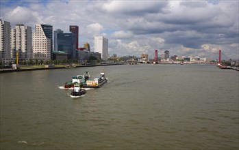 Tug boats of River Maas at Boompjes, waterfront area of central Rotterdam, Netherlands