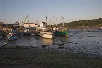 Boats at moorings at low tide, River Deben, Woodbridge, Suffolk, England, United Kingdom, Europe