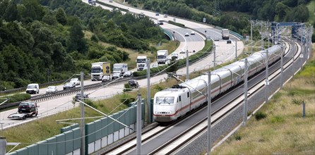 An ICE 1 on the high-speed line for ICE trains next to the A71 motorway near Behringen. The new