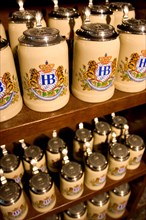 Beer mugs with logo of Hofbraeuhaus on lid for sale, Munich, Bavaria, Germany, Europe