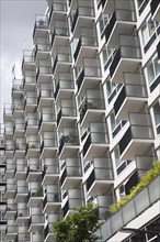 Geometric pattern formed by balconies of modern apartments in central Rotterdam, Netherlands