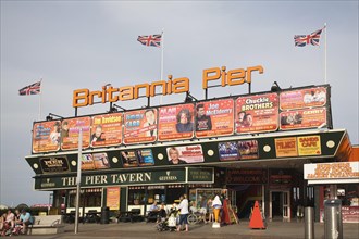 Britannia Pier entrance with adverts for theatre shows, Great Yarmouth, Norfolk, England, United