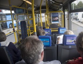 Passengers travelling on Airparks airport parking shuttle bus Gatwick airport, London, England,