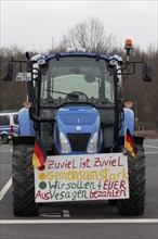 Tractor with sign, Too much is too much, Farmer protests, Demonstration against policies of the