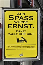 Sign indicating fines for inadequate waste disposal, Bern city centre, City of Bern, Switzerland,