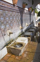 Moorish water fountain in the Andalucian village of Alcaucin, Malaga province, Spain, Europe