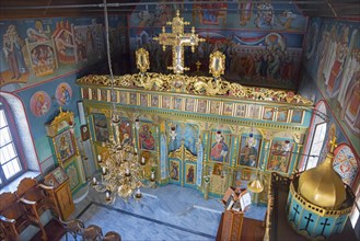 Church interior with magnificent iconostasis and impressive wall frescoes, Monastery of St