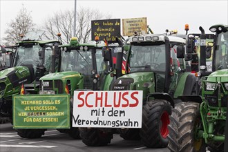 Stop the regulation madness, sign against bureaucracy on a tractor, farmers' protests,
