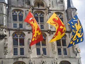 Flags flying on the town hall, Gouda, South Holland, Netherlands