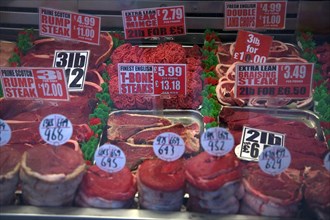 Meat display in butcher's shop window