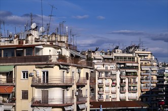 Residential buildings, roof antennas, Leonida Iasonidou street, morning light, Thessaloniki,