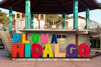 Colourful lettering of the municipality of Pluma Hidalgo, Pochutla, state of Oxaca, Sierra Madre
