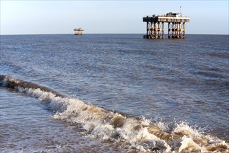 Offshore water intake and outlet towers supply cooling water to Sizewell nuclear power station,