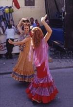 Flamenco dancers at street party in Velez-Malaga, Andalusia, Spain, Southern Europe. Scanned