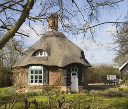 Unusual round thatched cottage, Easton, Suffolk, England, United Kingdom, Europe