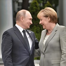 President of the Russian Federation Vladimir Vladimirovich Putin and German Chancellor Angela