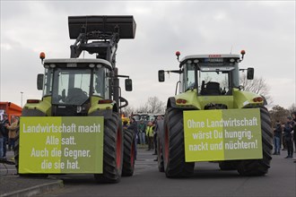 Tractors with posters on agriculture, farmers' protests, demonstration against the policies of the