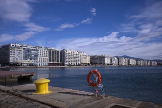 Old harbour, view of waterfront, lifebuoy, bollard, skyline of Thessaloniki, Macedonia, Greece,