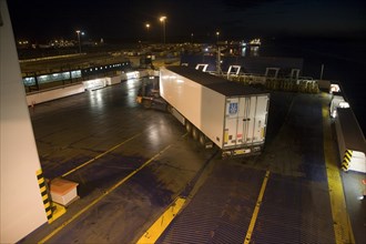 Loading heavy goods vehicle on to the overnight ferry to Netherlands at the port of Harwich, Essex,